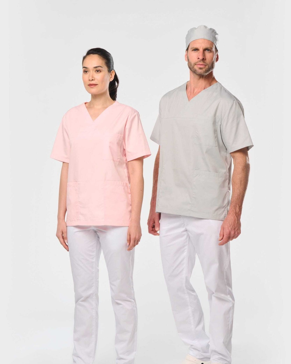 Schorten WK. DESIGNED TO WORK Unisex tuniek met korte mouwen van polykatoen voor bedrukking &amp; borduring