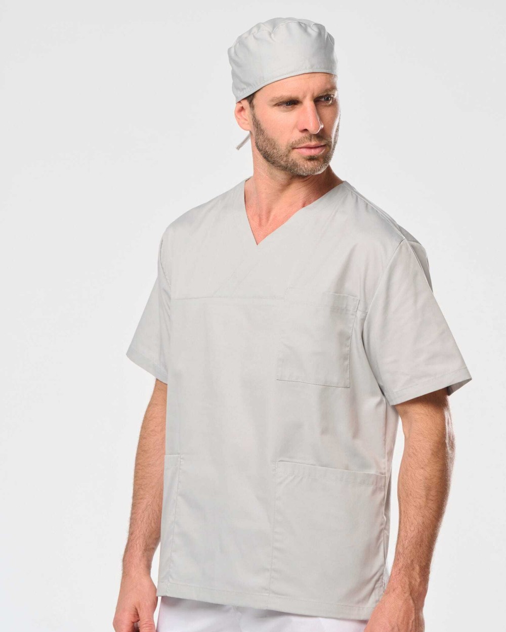 Schorten WK. DESIGNED TO WORK Unisex tuniek met korte mouwen van polykatoen voor bedrukking &amp; borduring