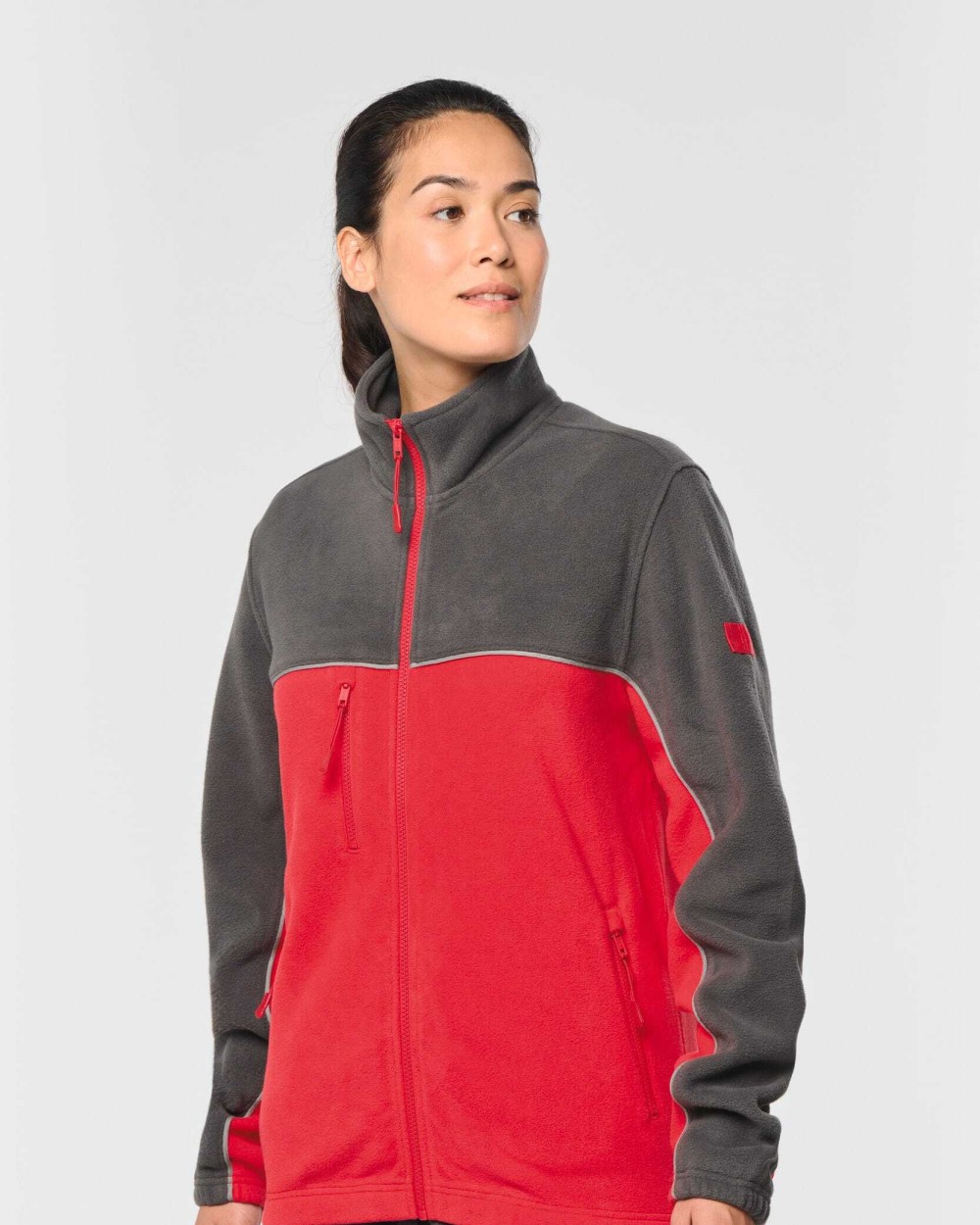 Polar Fleeces WK. DESIGNED TO WORK Tweekleurig ecologisch uniseks fleecevest voor bedrukking &amp; borduring