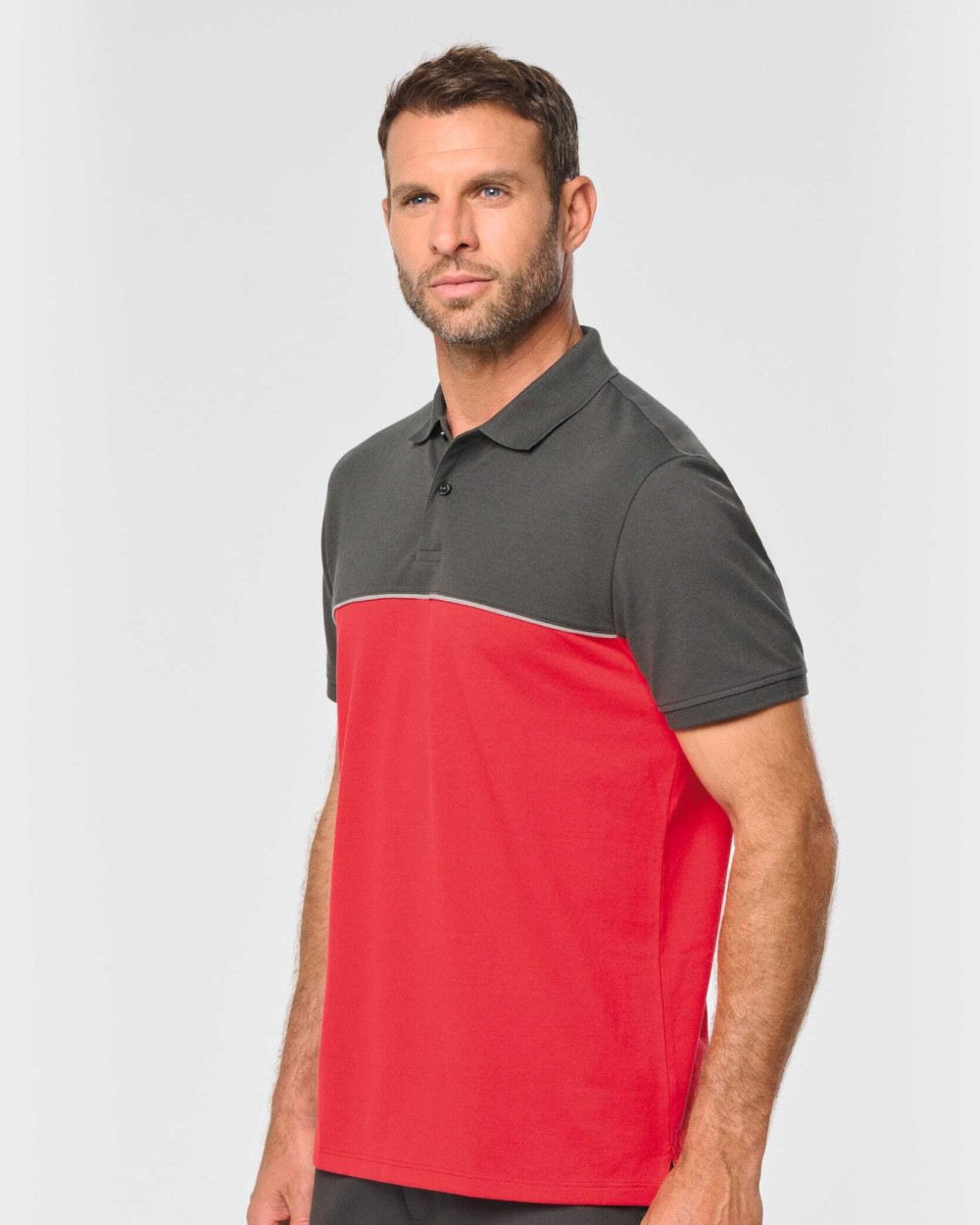 Polo's WK. DESIGNED TO WORK Ecologische uniseks polo met korte mouwen in twee kleuren voor bedrukking &amp; borduring