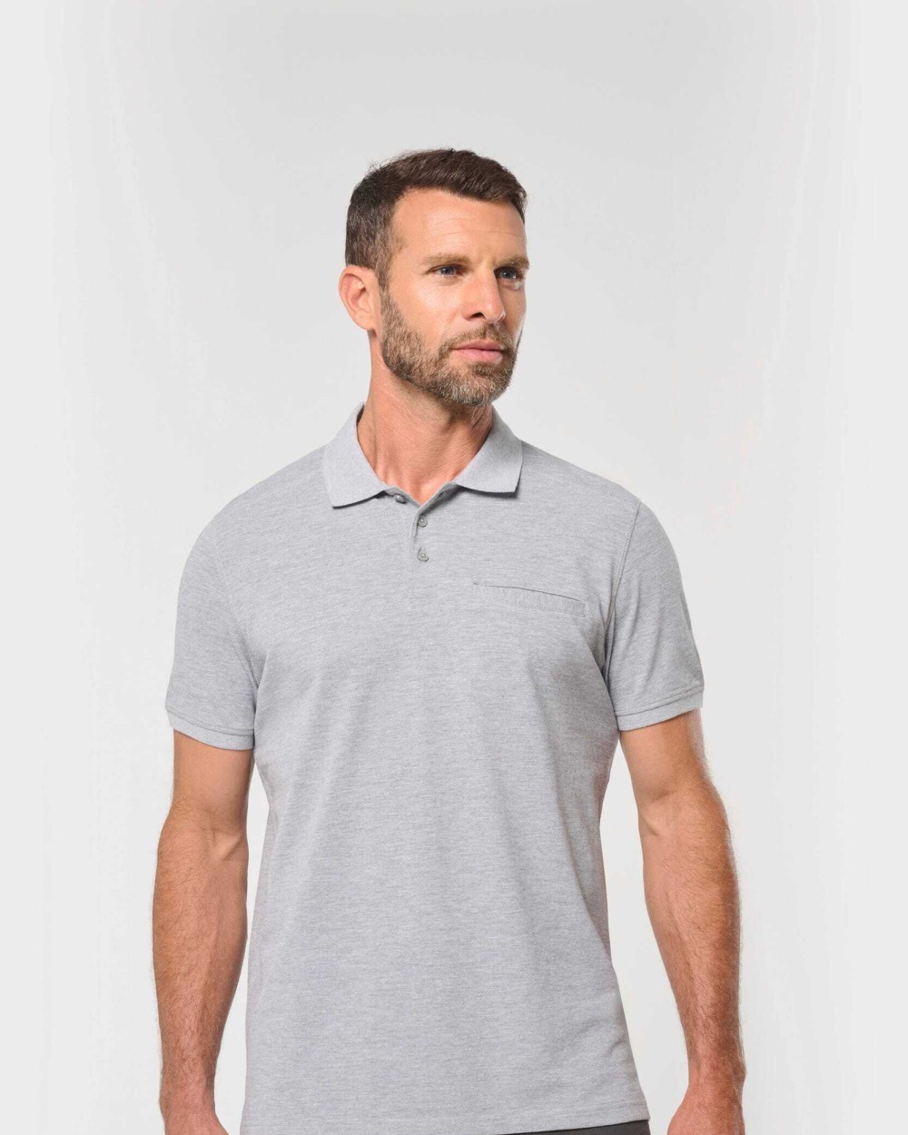 Polos personnalisable WK. DESIGNED TO WORK Polo unisexe écoresponsable avec poche poitrine