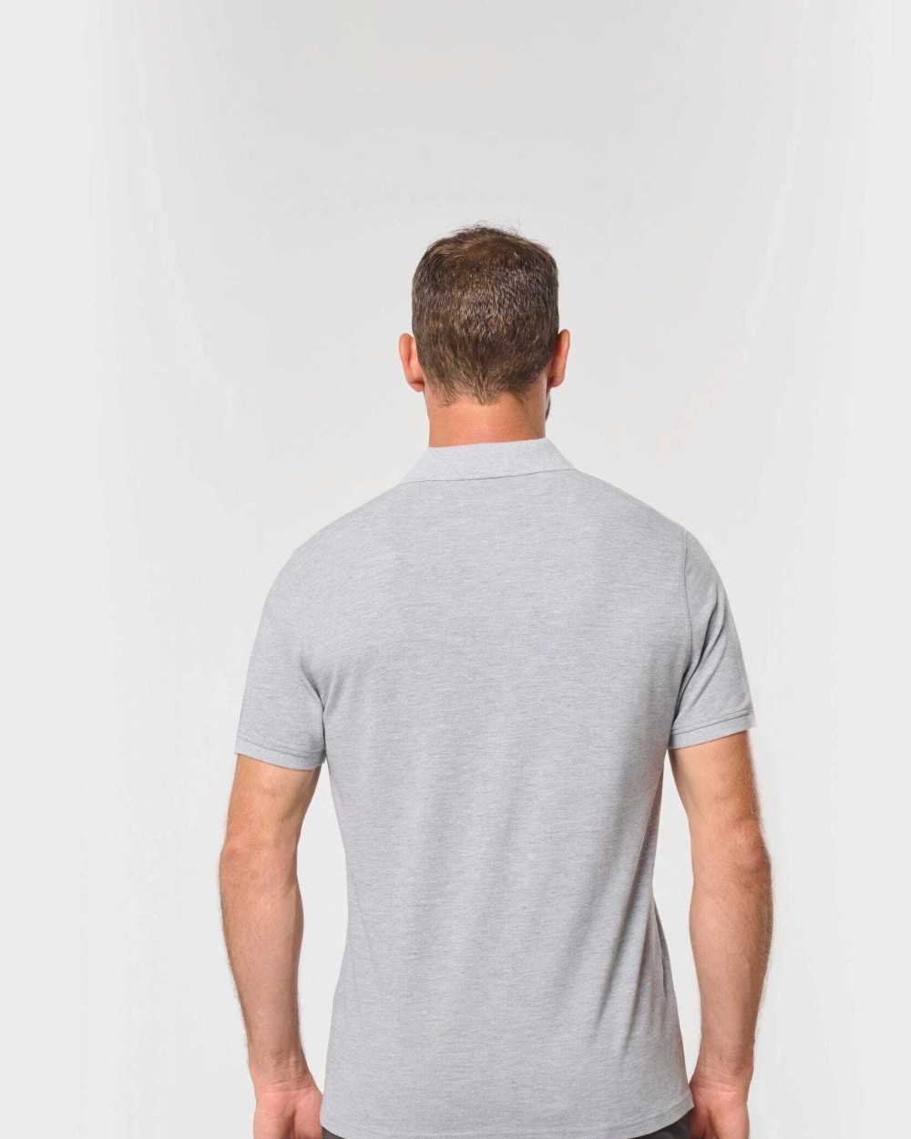 Polos personnalisable WK. DESIGNED TO WORK Polo unisexe écoresponsable avec poche poitrine