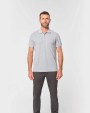 Polos personnalisable WK. DESIGNED TO WORK Polo unisexe écoresponsable avec poche poitrine