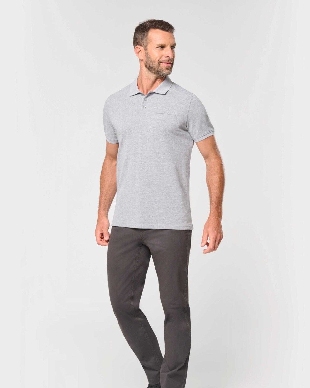 Polos personnalisable WK. DESIGNED TO WORK Polo unisexe écoresponsable avec poche poitrine