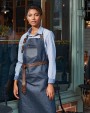 Schorten PREMIER Division - Waxed look denim bib apron with faux leather voor bedrukking &amp; borduring