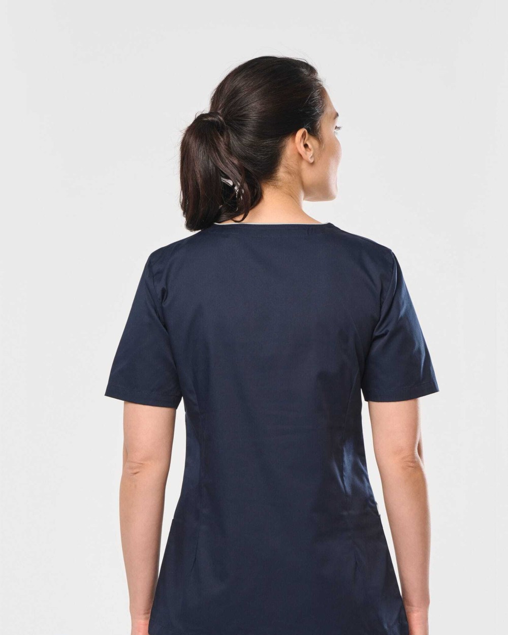 Schorten WK. DESIGNED TO WORK Damesblouse van polykatoen met drukknopen voor bedrukking &amp; borduring