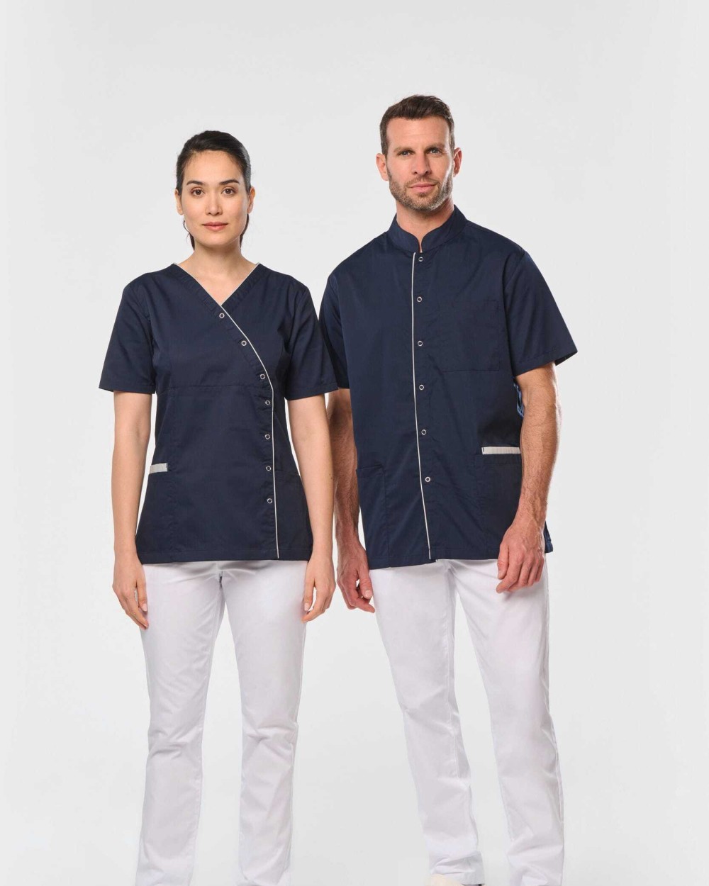 Schorten WK. DESIGNED TO WORK Damesblouse van polykatoen met drukknopen voor bedrukking &amp; borduring