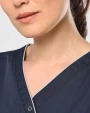Schorten WK. DESIGNED TO WORK Damesblouse van polykatoen met drukknopen voor bedrukking &amp; borduring