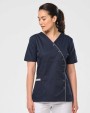 Schorten WK. DESIGNED TO WORK Damesblouse van polykatoen met drukknopen voor bedrukking &amp; borduring