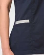 Schorten WK. DESIGNED TO WORK Damesblouse van polykatoen met drukknopen voor bedrukking &amp; borduring