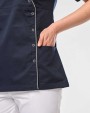 Schorten WK. DESIGNED TO WORK Damesblouse van polykatoen met drukknopen voor bedrukking &amp; borduring