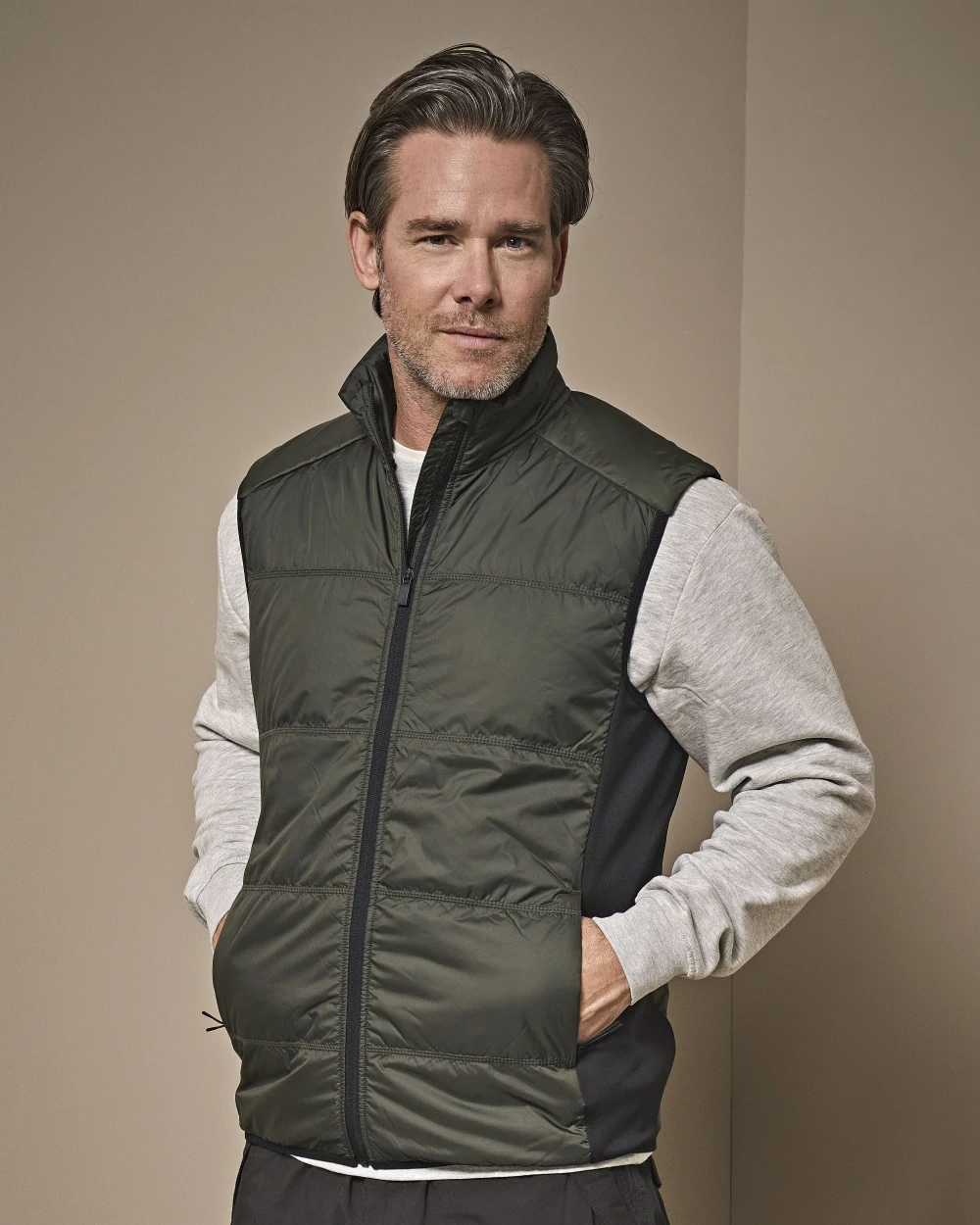 Jassen TEE JAYS HYBRID-STRETCH BODYWARMER voor bedrukking &amp; borduring