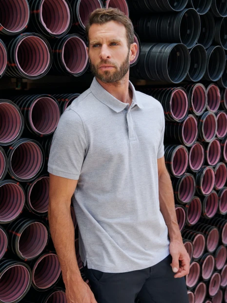Polos à personnaliser WK. DESIGNED TO WORK Polo col boutons pression manches courtes homme 