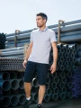 Polos à personnaliser WK. DESIGNED TO WORK Polo col boutons pression manches courtes homme 