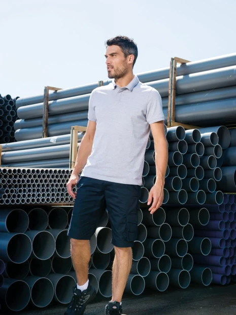 Polos à personnaliser WK. DESIGNED TO WORK Polo col boutons pression manches courtes homme 