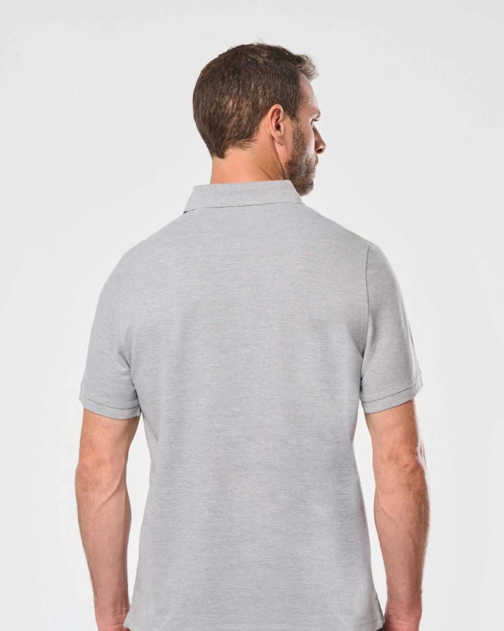 Polo's WK. DESIGNED TO WORK Herenpolo met drukknoopkraag en korte mouwen voor bedrukking &amp; borduring