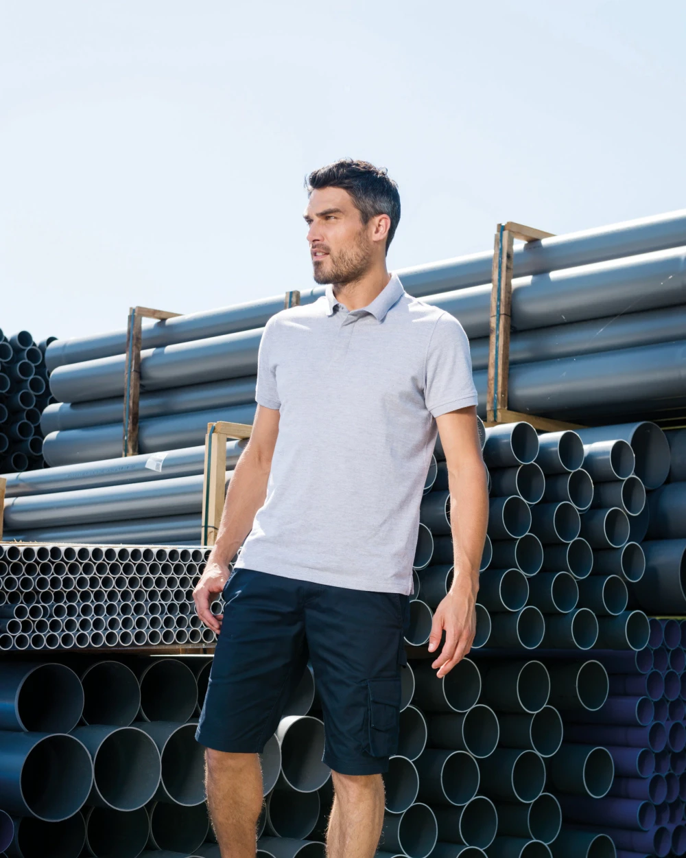 Polo's WK. DESIGNED TO WORK Herenpolo met drukknoopkraag en korte mouwen voor bedrukking &amp; borduring