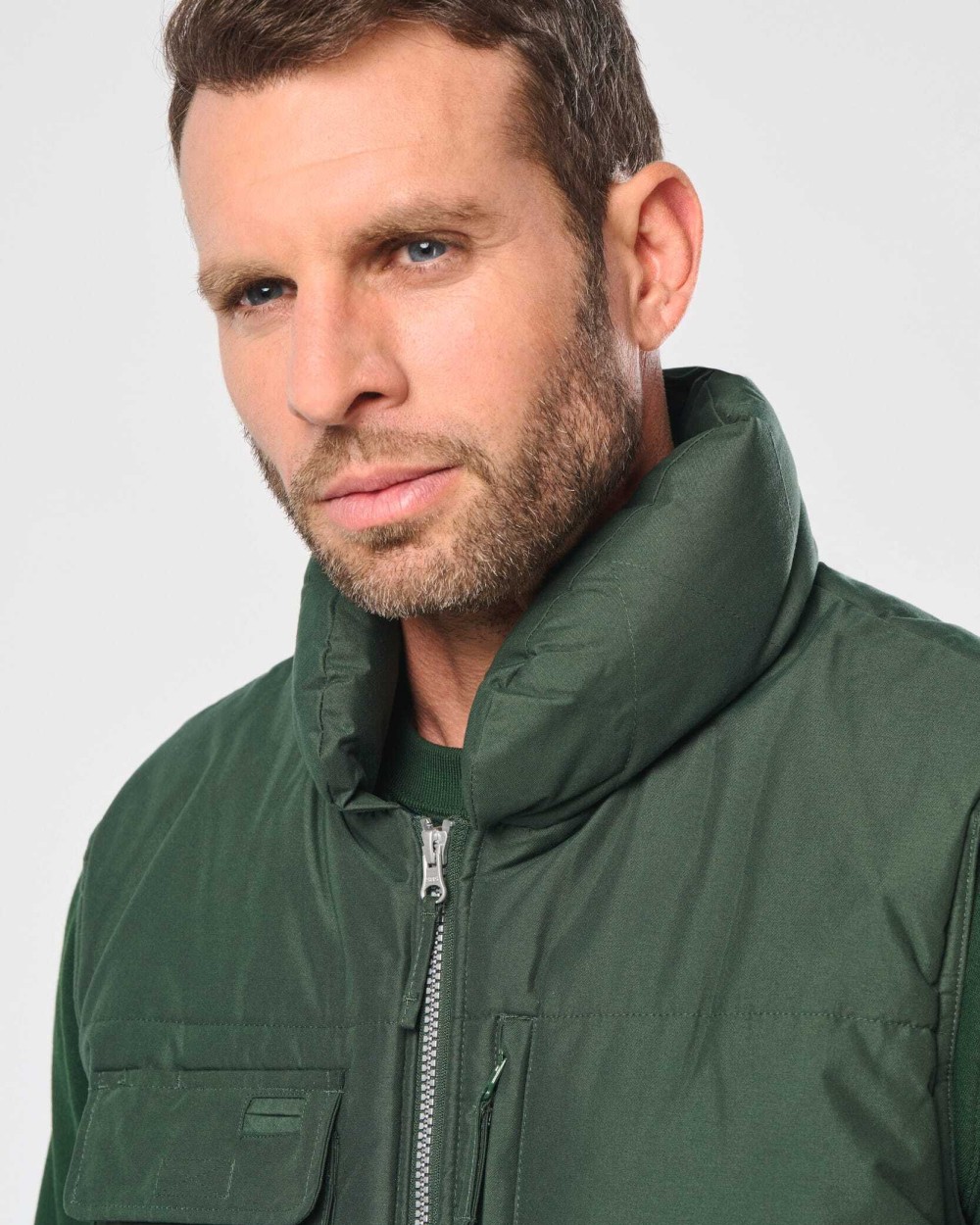 Jassen WK. DESIGNED TO WORK Gewatteerde bodywarmer voor bedrukking &amp; borduring