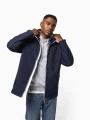 Vestes à personnaliser KARIBAN Veste imperméable unisexe 
