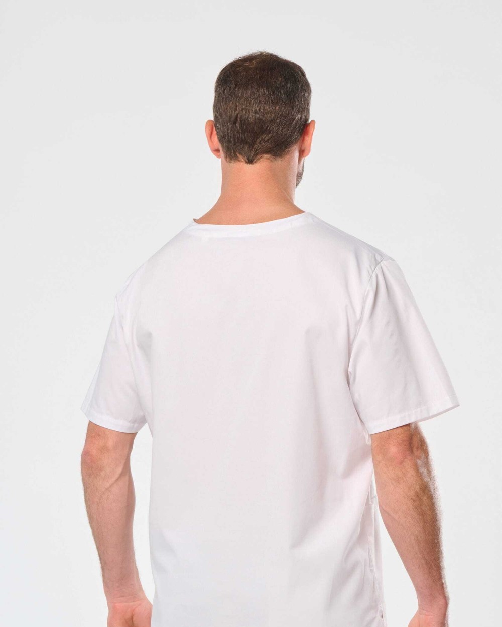 Schorten WK. DESIGNED TO WORK Katoenen unisex tuniek met korte mouwen voor bedrukking &amp; borduring